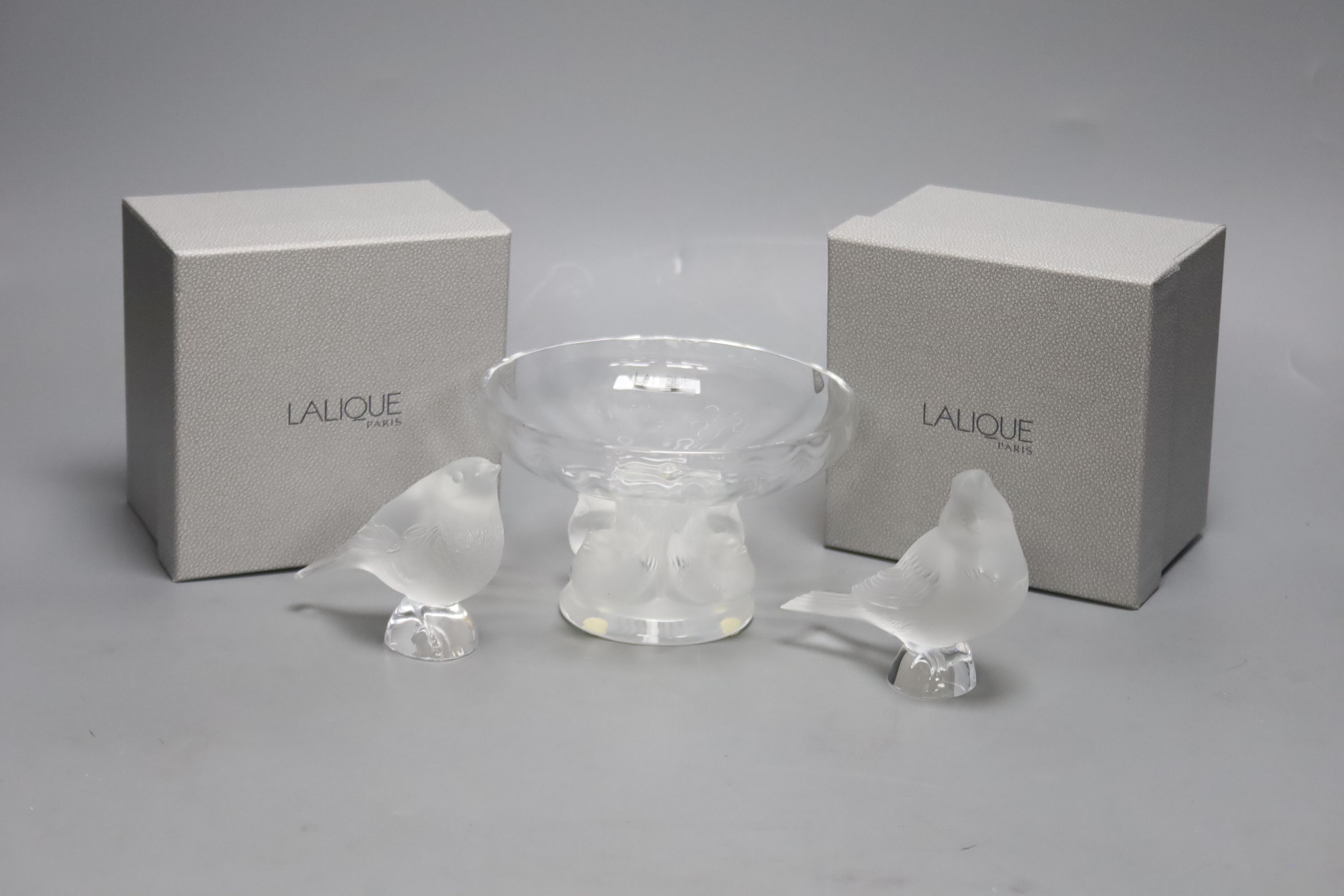 A Lalique 'Nogent' bowl and two frosted glass models of birds, 'Singing Robin' and 'Worried Robin'